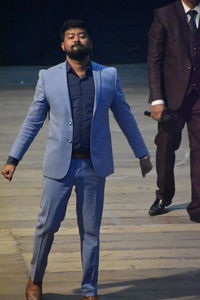 Full length of a young couple walking outdoors