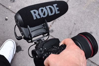 High angle view of man hand on road