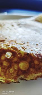 Close-up of ice cream on beach