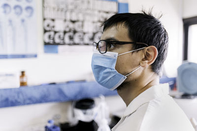 Male scientist wearing face mask