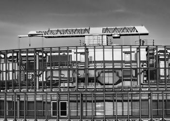 Low angle view of abandoned building against sky