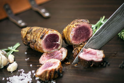 Close-up of meat on cutting board