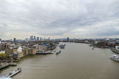 High angle view of river amidst buildings in city