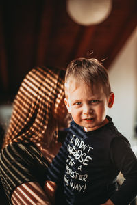 Portrait of boy with mother