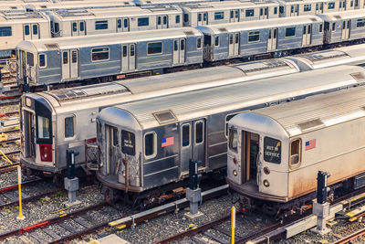 Row of trains in the maintenance shop at sunset. new york city. united states.