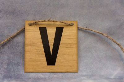 Close-up of text on wood