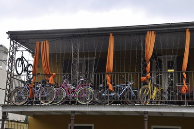 Bicycle parked in front of built structure
