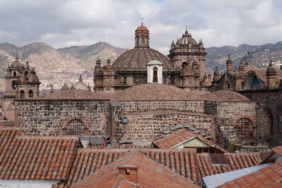 View of temple against cloudy sky