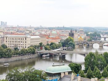 High angle view of bridge over river against buildings