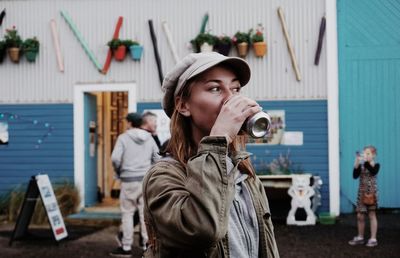 Young woman having drink