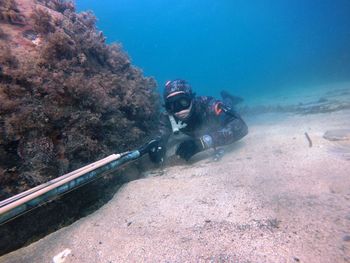 Man scuba diving in sea