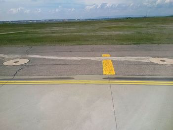 Yellow arrow symbol on road