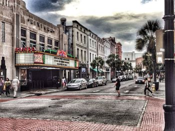 City street against cloudy sky