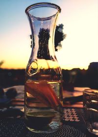 Close-up of glass bottle on table