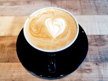 High angle view of cappuccino on table
