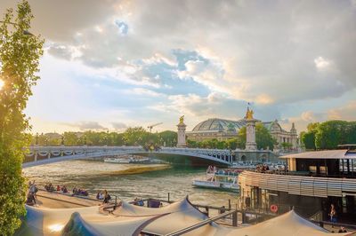 View of bridge against cloudy sky