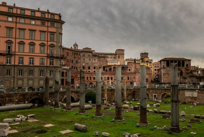 Buildings in city against sky