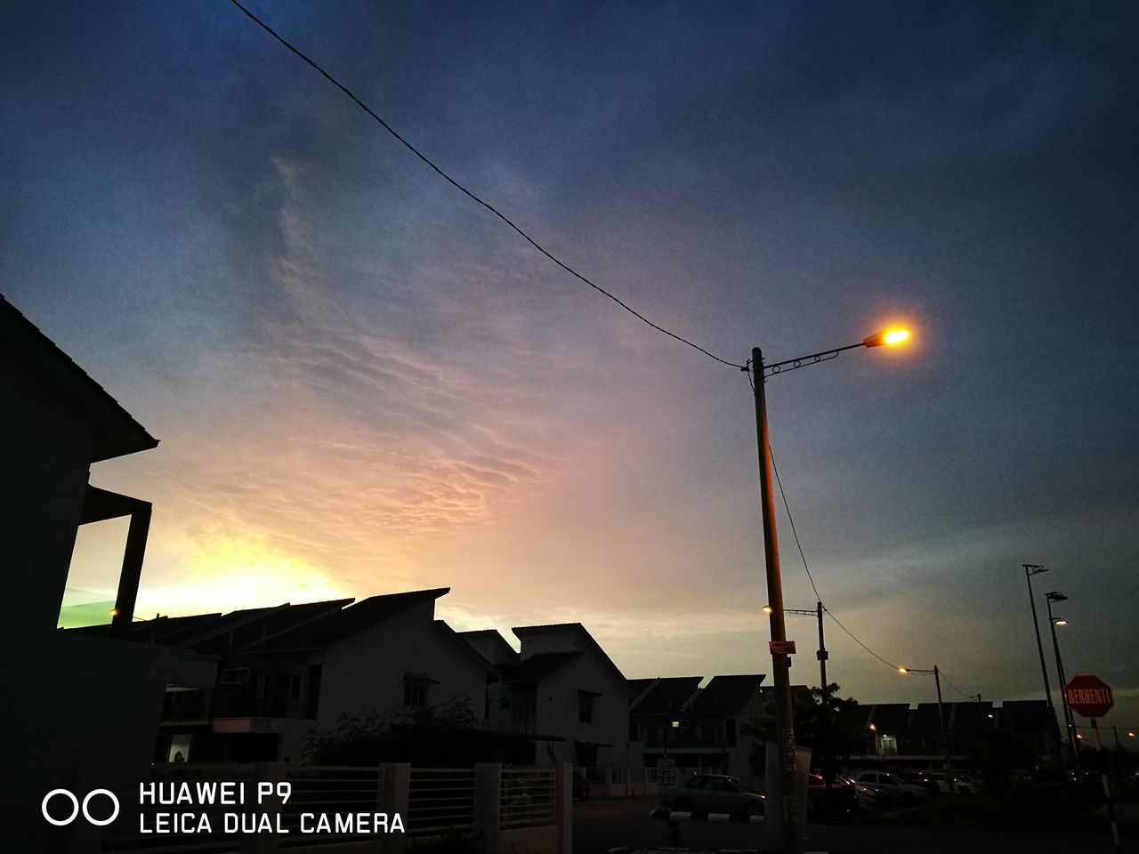 architecture, built structure, building exterior, sunset, low angle view, sky, travel destinations, cloud - sky, no people, city life, power line, scenics, tourism