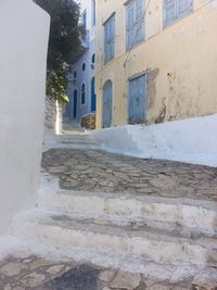 Narrow alley amidst buildings in city