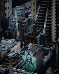 High angle view of buildings in city at night