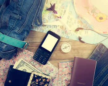 High angle view of mobile phone on table