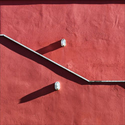 High angle view of metallic object on wall