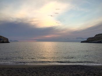Scenic view of sea against sky at sunset