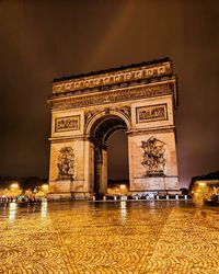 View of historical building at night arc de triomphe