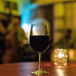 Close-up of wineglass on table