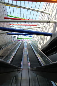 Low angle view of escalator at railroad station