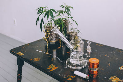 High angle view of medicines in grinder on table