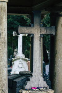 Close-up of cross in cemetery