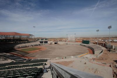 Panoramic view of construction site in city against sky