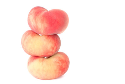 Close-up of apples against white background