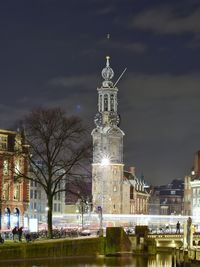 Illuminated buildings in city at night