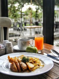 Close-up of breakfast served on table