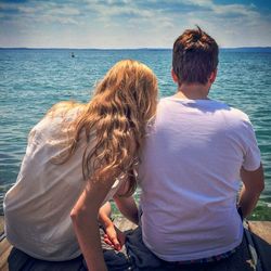 Rear view of woman looking at sea