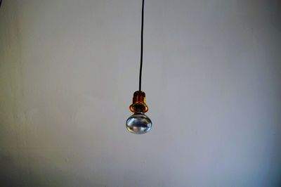 Low angle view of electric lamp