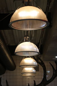 Low angle view of illuminated electric lamp