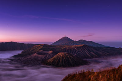 View of volcanic mountain during sunset