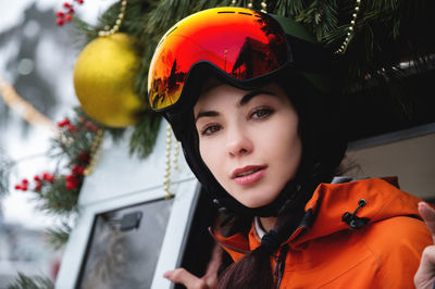 Portrait of young woman wearing hat