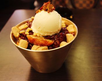 Close-up of ice cream in bowl on table