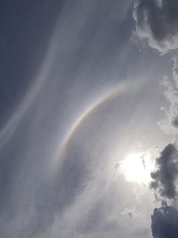 Low angle view of rainbow in sky