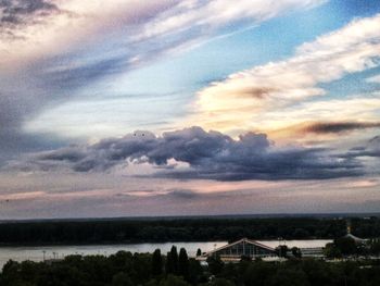 Scenic view of landscape against cloudy sky