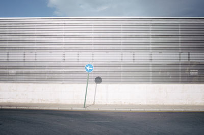 Metallic structure against sky