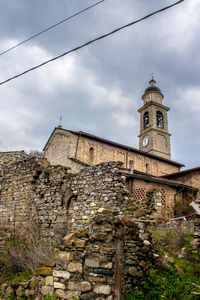 Low angle view of old building against sky