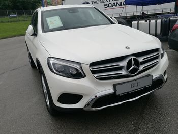 Close-up of car parked on street