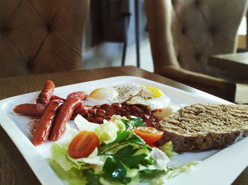 Close-up of breakfast served on table