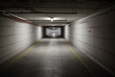 View of empty illuminated corridor