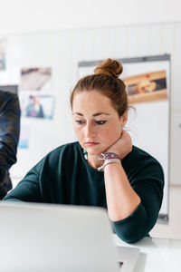 Close-up of woman working in office